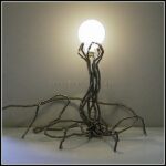 scultura acciaio lampada